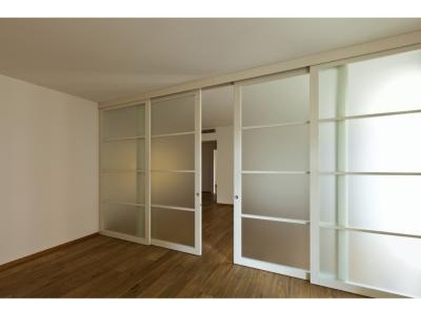 Split-level home with large glass sliding doors