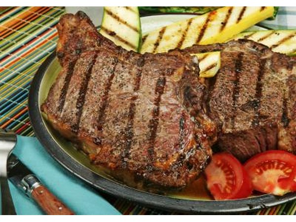 A grilled black angus rib-eye steak
