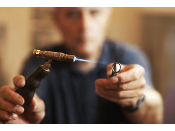 A jeweler can solder two beads of metal on the inside of the ring.