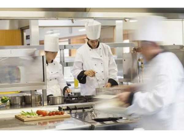 Busy chefs in kitchen