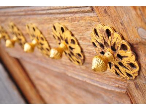 Brass fixtures on old door