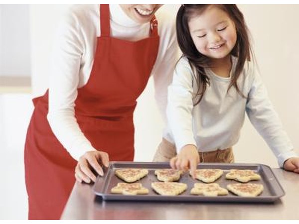 Girl looking at Christmas cookies