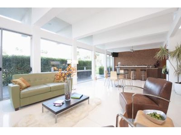 Two low couches are balanced with low and narrow side tables