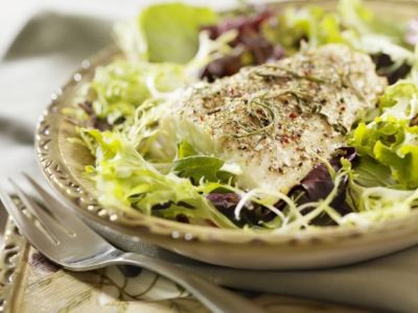 grilled fish on healthy salad