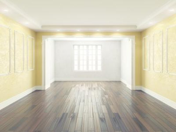Yellow walls work well with oak cabinetry and dark wood flooring
