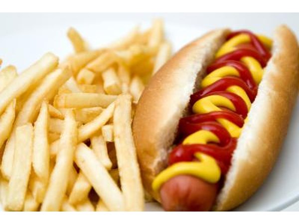 A hot dog with french fries.
