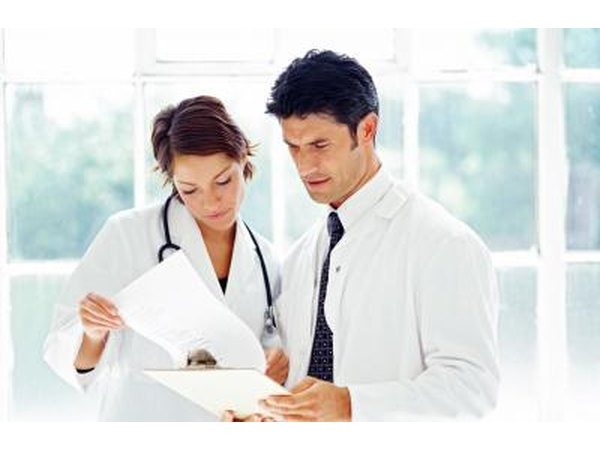 Doctors looking at charts