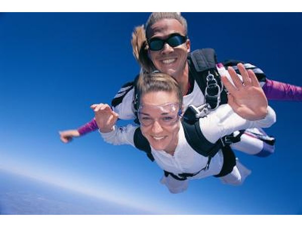 Woman tandem skydiving