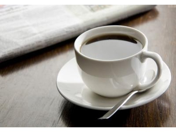 A cup of black coffee.