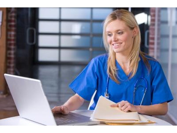 nurse completing online coursework