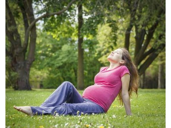 Pregnant woman in field