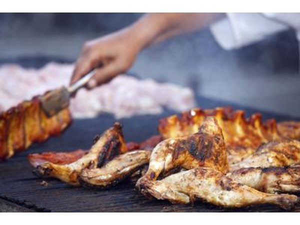 Chicken and meat on barbecue