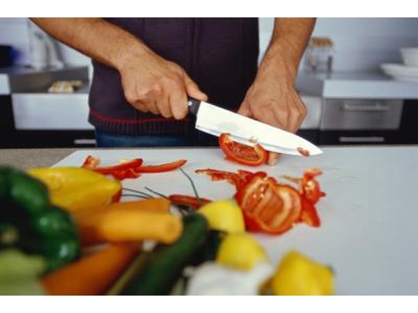 Man chopping vegetables
