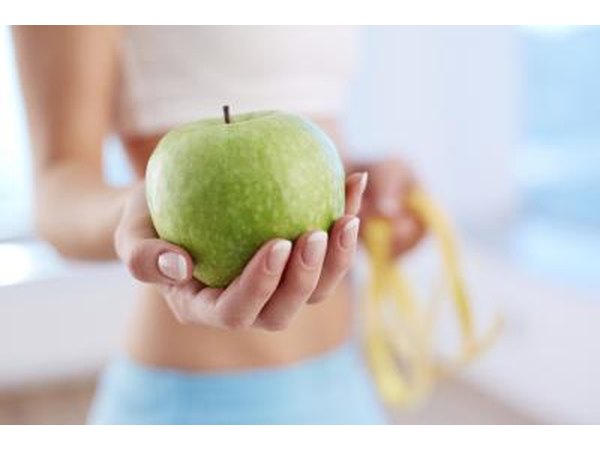 Lose weight with a combination of diet and exercise.