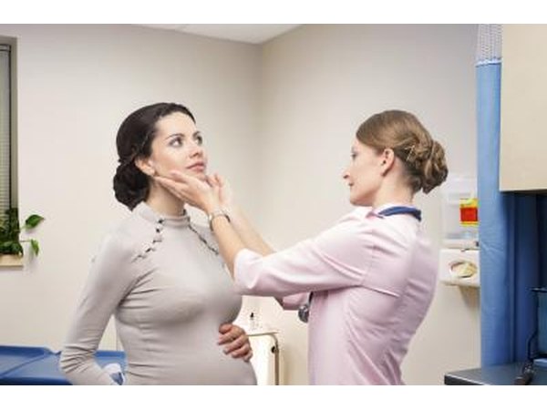 Checking thyroid.