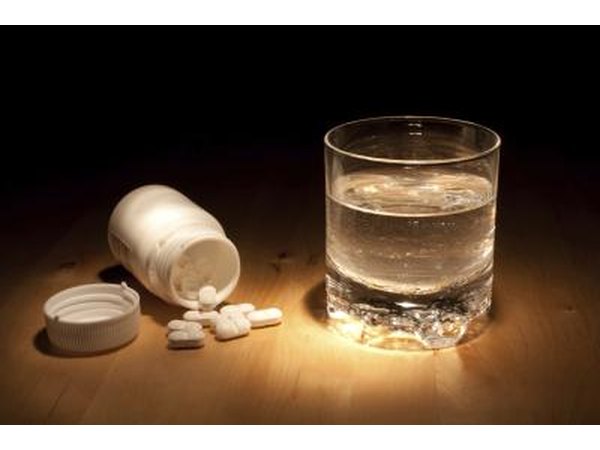 Ibuprofen with a glass of water.