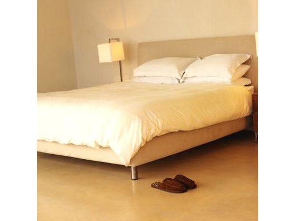 Bedside lamp near Queen Size bed.