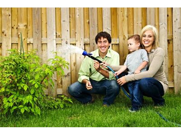 Take caution when watering plants near a fence