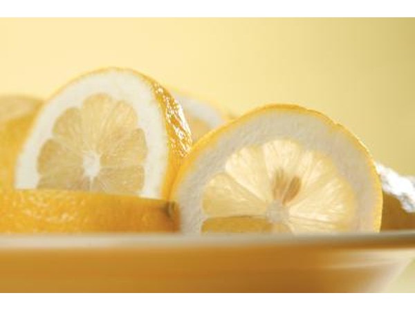 Slice a lemon into strips.