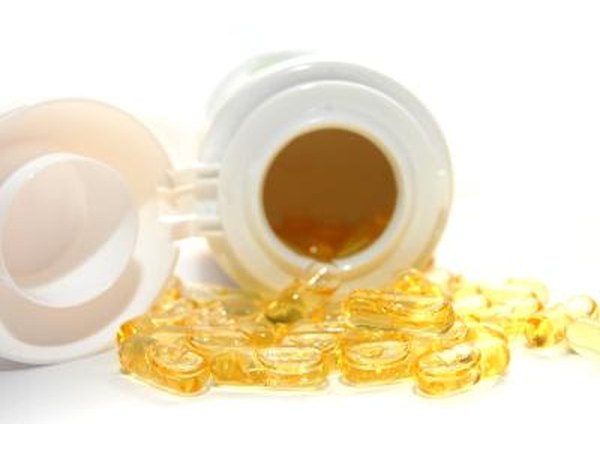 Vitamin D spilling out of bottle.