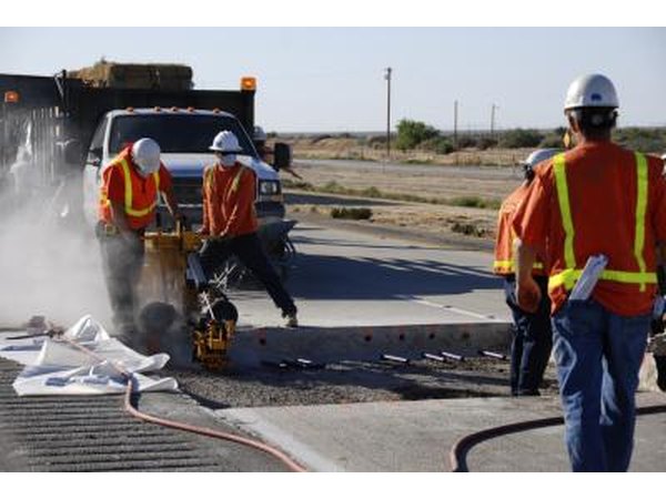 Workmen at a freeway construction site