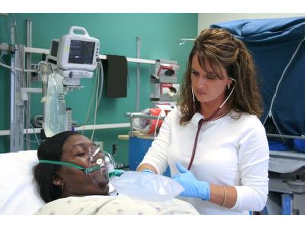 emergency room doctor checking on patient