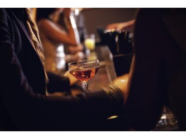 Assign the bride random tasks such as "Lick the glass of someone at the bar that you do not know".