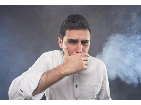 Coughing young man.