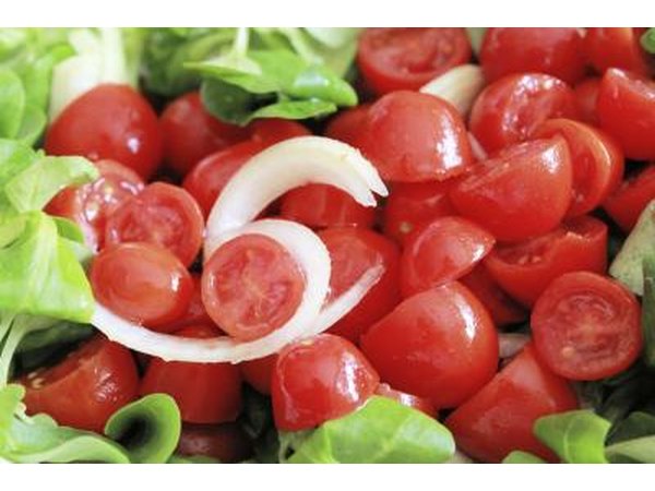 Sliced lettuce, tomato and onions