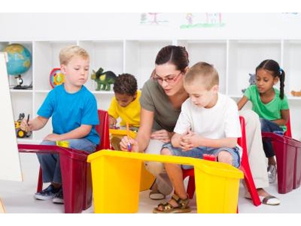 Kindergarten teacher with students