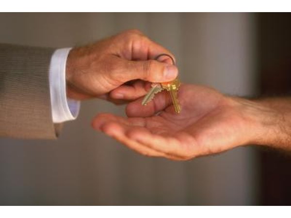 Man handing over keys