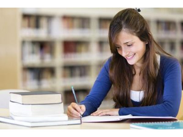college student studying in library