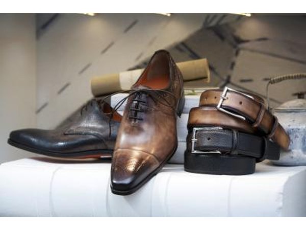 Shoes and matching belts in store window