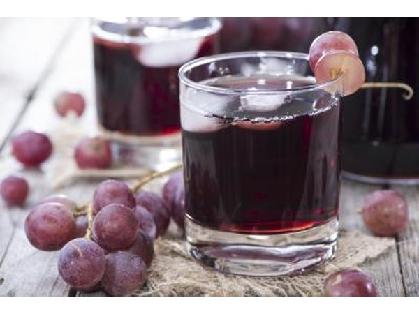 Small glasses of grape juice.