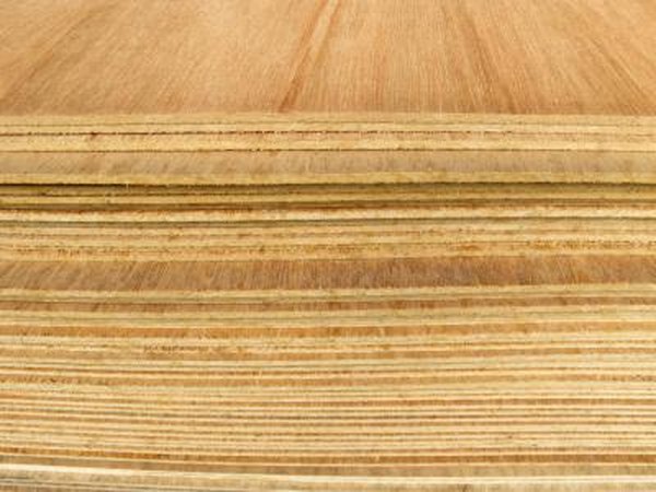 Close-up of a pile of plywood planks
