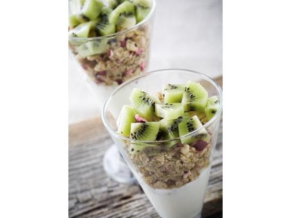 Bowls of granola, fruit and yogurt
