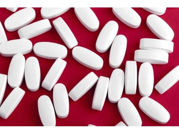 Magnesium supplements on a red background