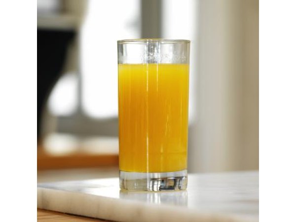 A glass of orange juice.