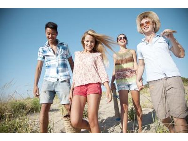 Teenagers walking to beach