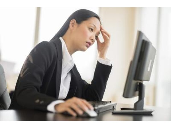 A woman feeling fatigue at work
