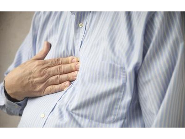 Man holding chest