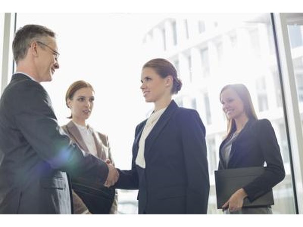 Management analyst meets with her client