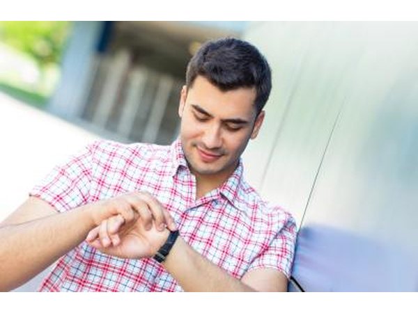 Man looking at watch