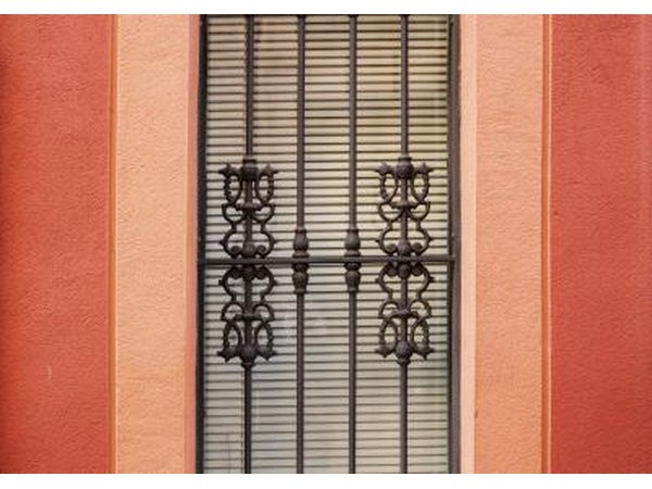 Wrought iron bars over a window in Spain.