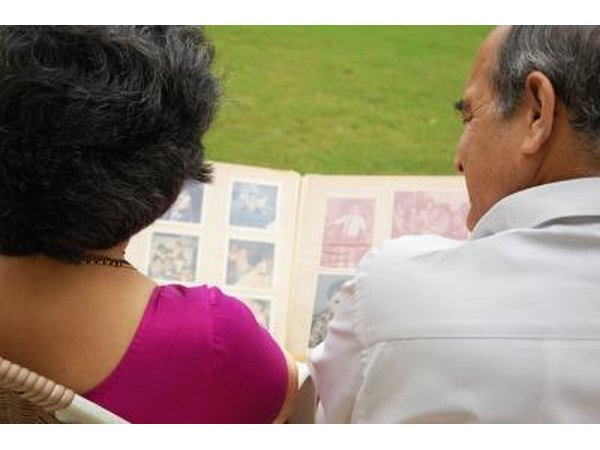 Couple looking at photo album