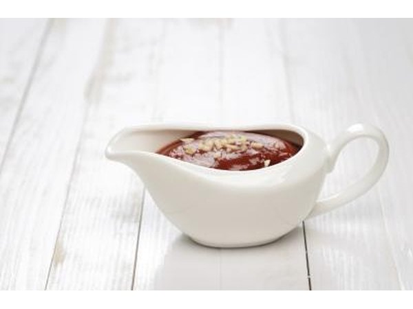 Small gravy boat on table