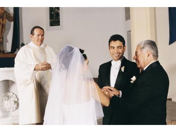 Father giving away bride