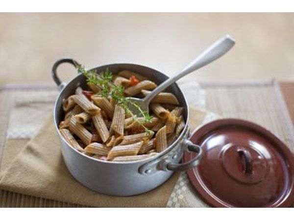 Pot filled with whole wheat pasta.