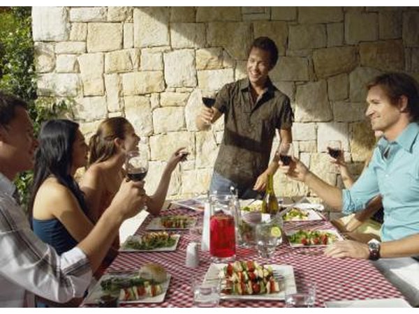 Friends toast at table