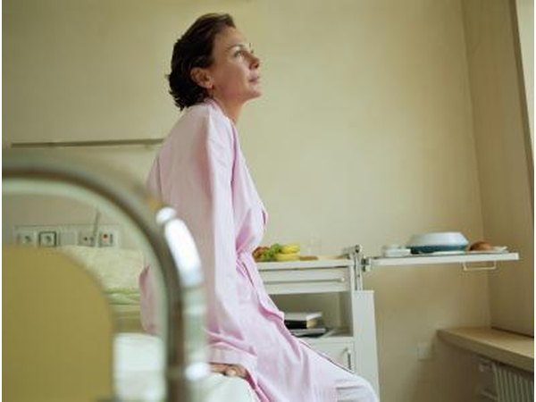 Female patient alone in hospital.